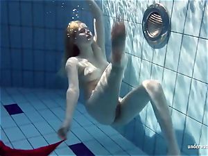 scorching blond Lucie French teen in the pool