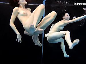 two nymphs swim and get bare magnificent