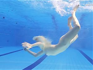hot Elena flashes what she can do under water
